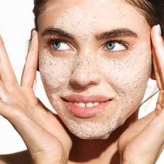 woman using the face scrub